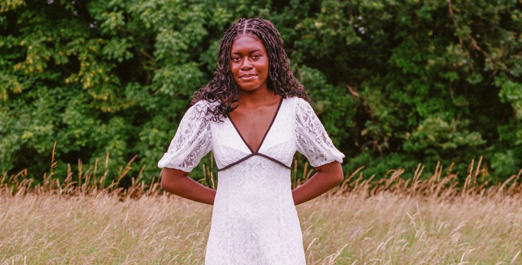 Portrait of Bel in a grassy field.