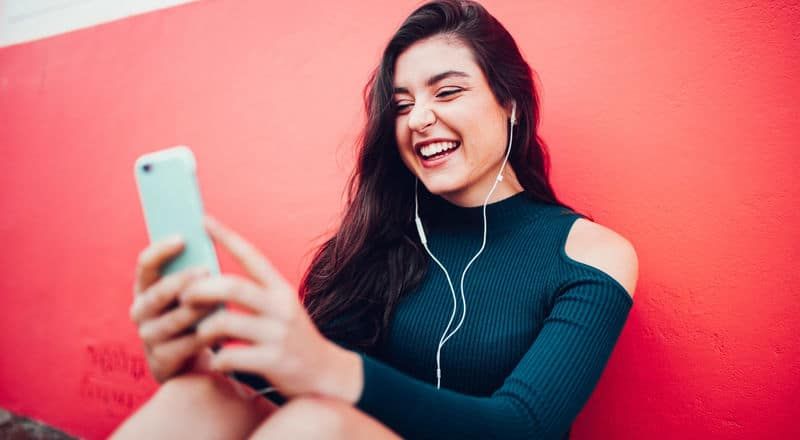 Illustrative image of a person smiling at home.