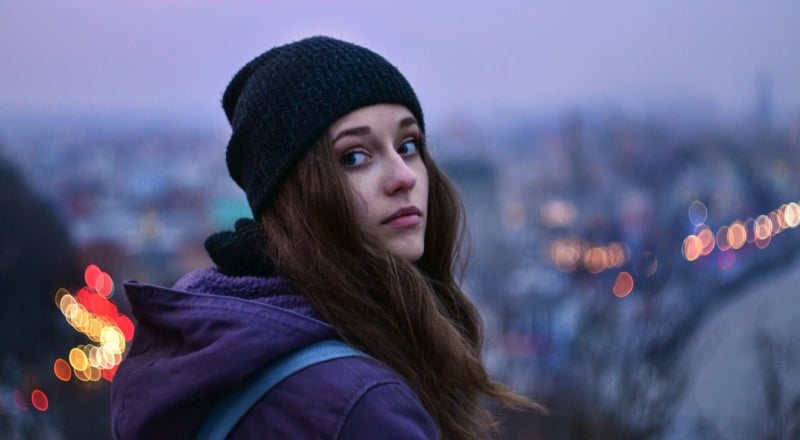 Illustrative image of a person looking over their shoulder.