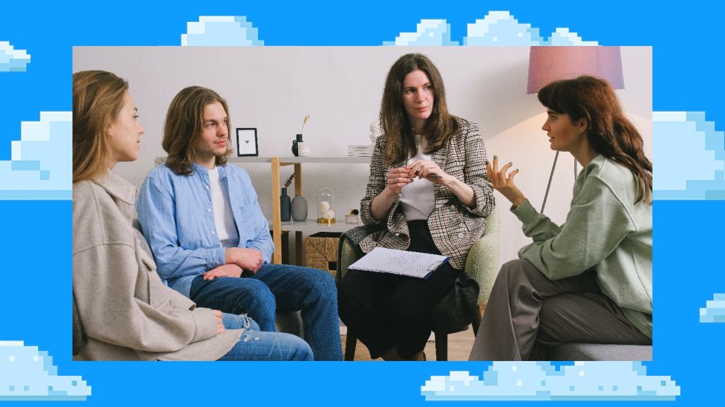 Illustrative image of four people sitting together and interacting indoors.