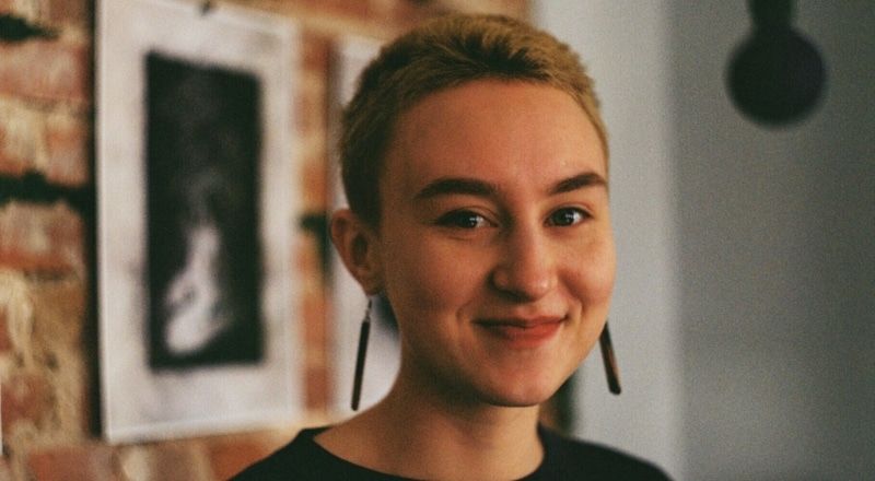 Illustrative photo of a person smiling at the camera