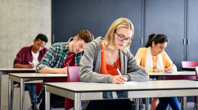 Group of students taking an exam
