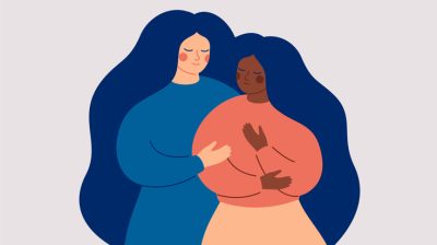 Illustrative image of a person comforting another person who is in distress.