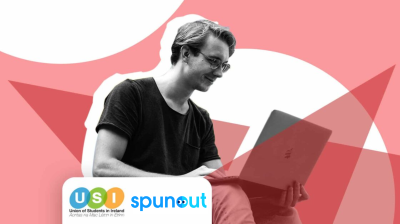 man on laptop with USI and spunout logo beneath him