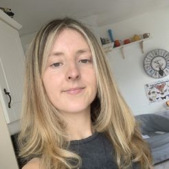 Caroline smiles at camera