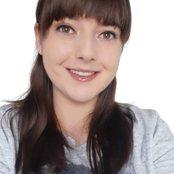 kelly smiles at camera