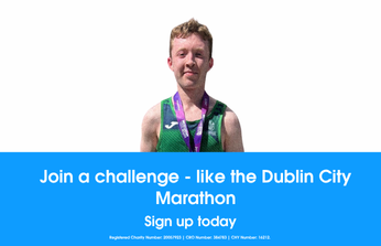 A person with a medal who has entered a marathon