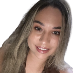 Aleksandra smiles at camera