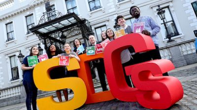 Young people posing with big SDG letters