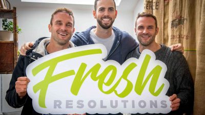 Jamie White and Happy Pear Twins holding Fresh Resolutions sign