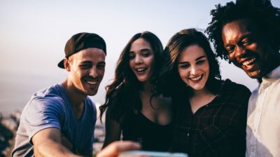 Group-of-college-friends-taking-a-selfie-Te0Q4j