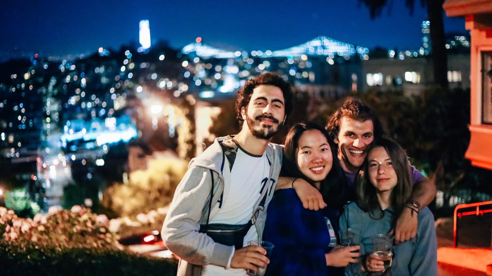 Group-of-young-people-overlooking-a-city