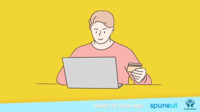 Illustration of a person at a laptop with their bank card in one hand