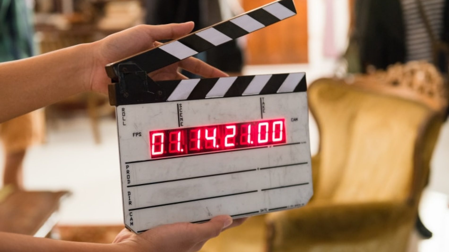 image of a clapper board on a movie set