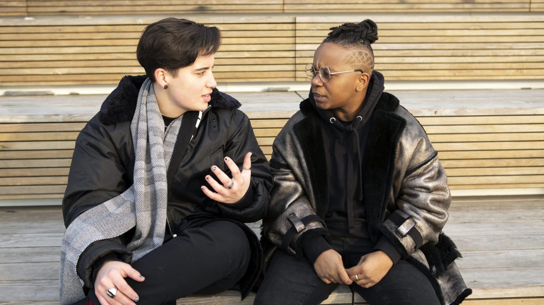 Two trans young people taking together