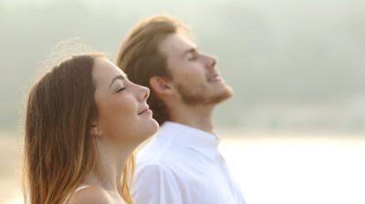 Man and woman breathing in