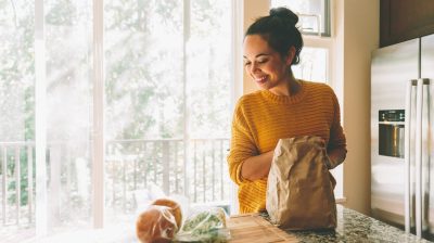Young person buying Fairtrade groceries