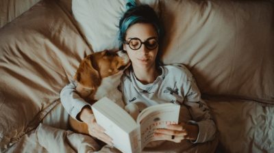 Young-person-reading-in-bed-CADNSy