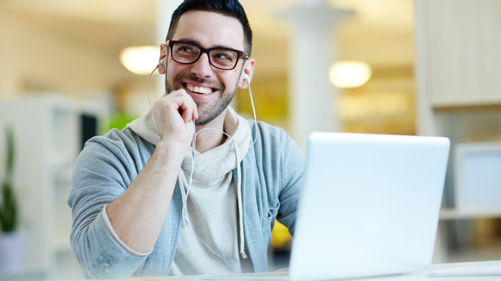 Smiling Adult Man Listening to Music