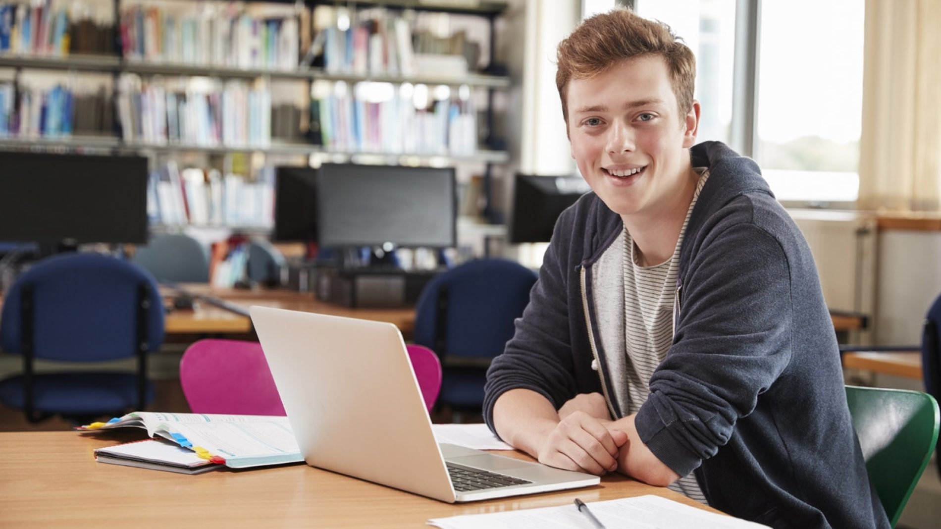 Young man studying in the library