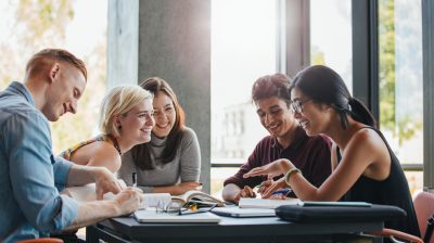 Students studying in college library