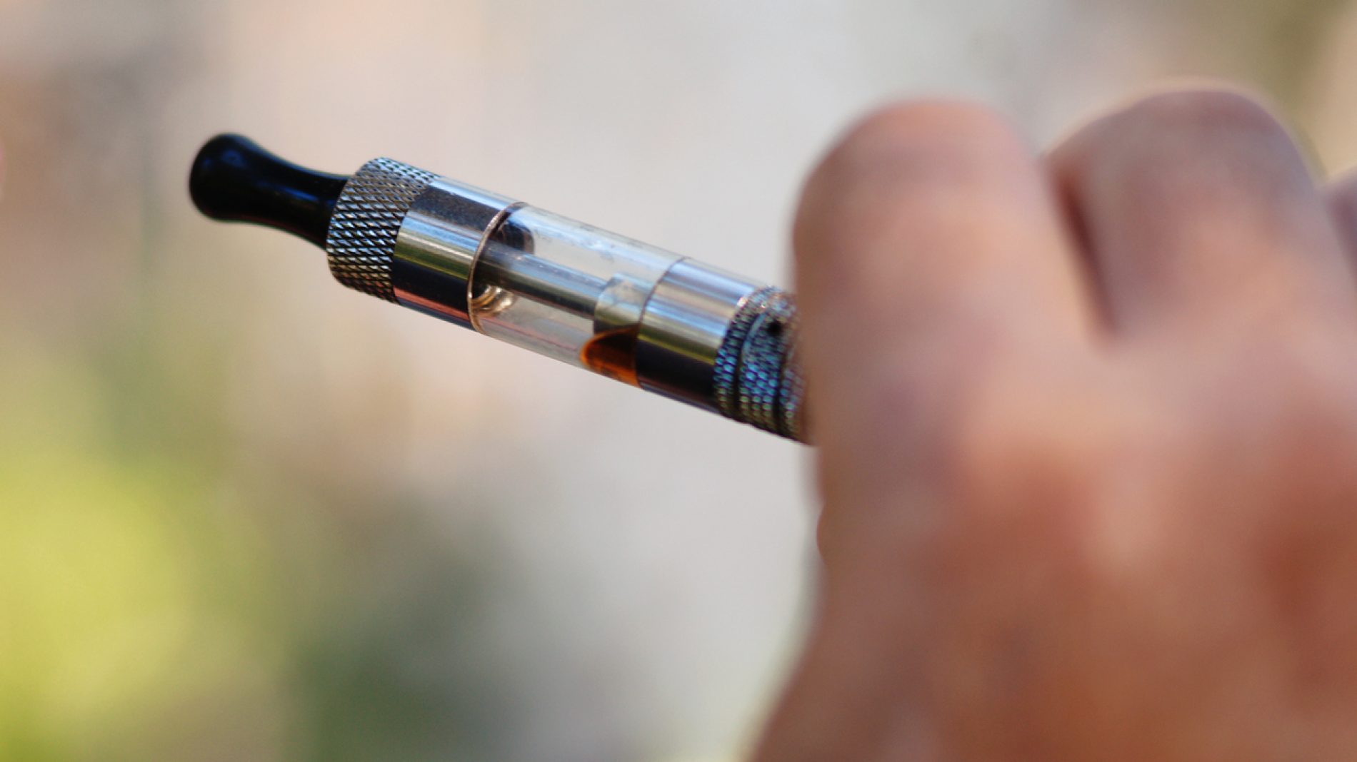 Person hand holding electronic cigarette