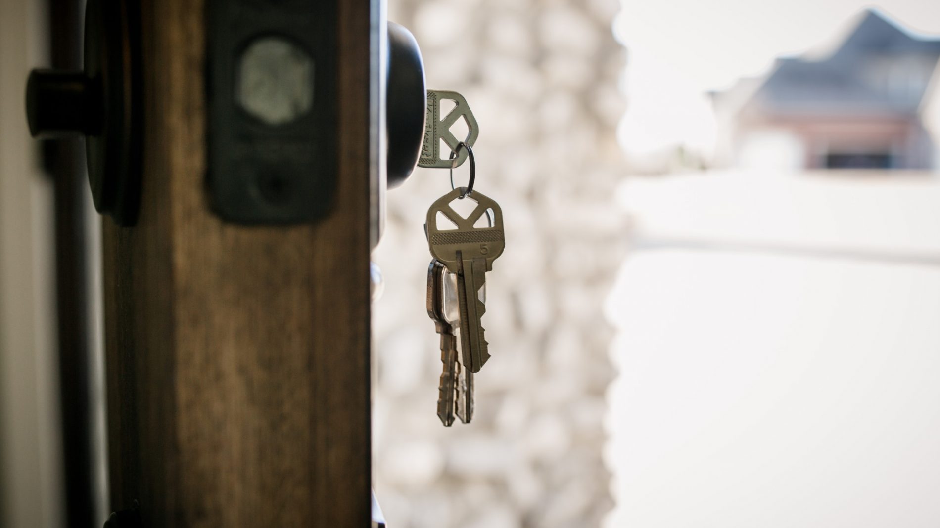 A set of keys hanging from a door - eviction