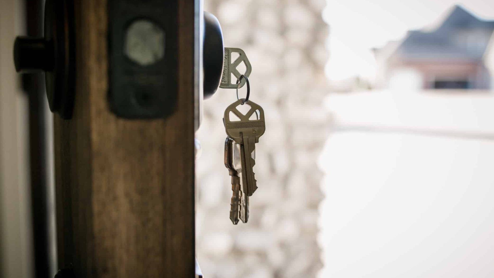 A set of keys hanging from a door - eviction
