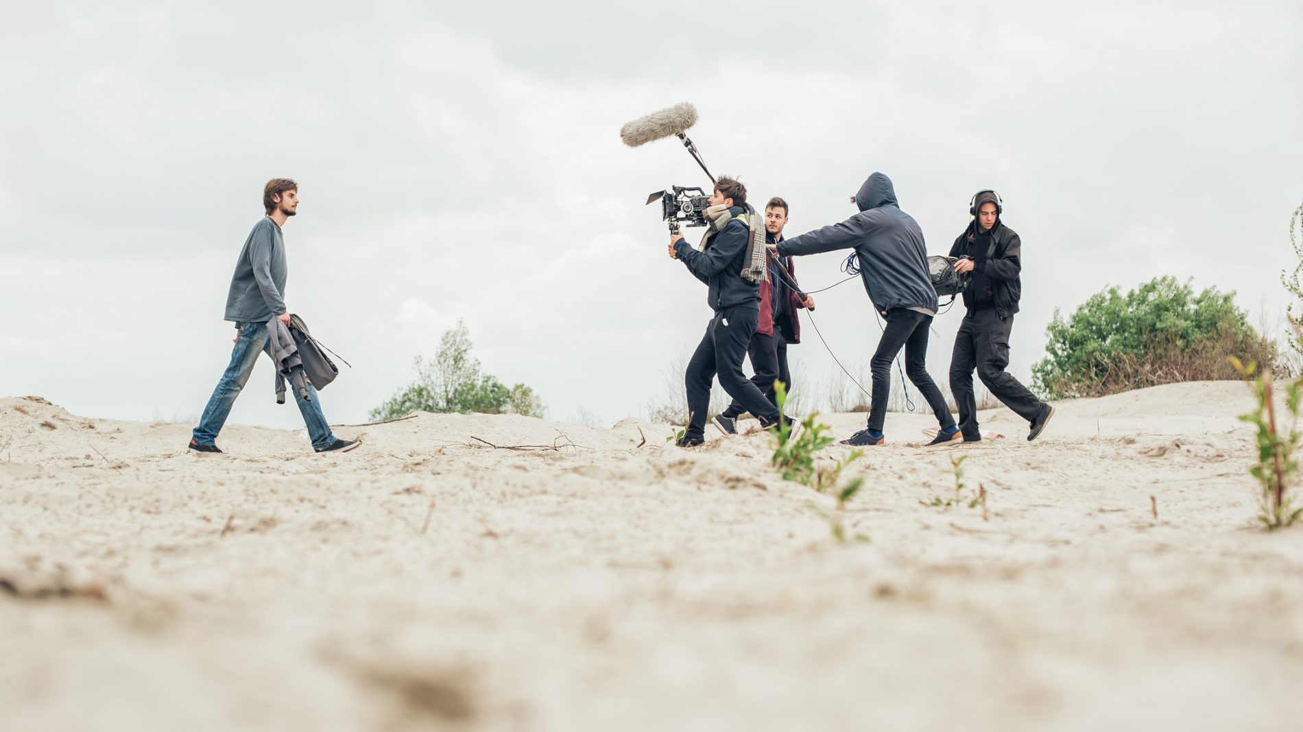 film crew on a beach