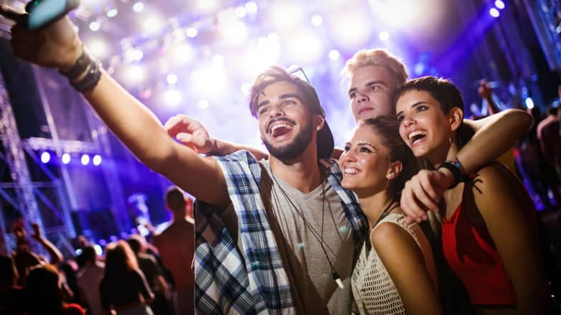 group-selfie-in-a-night-club
