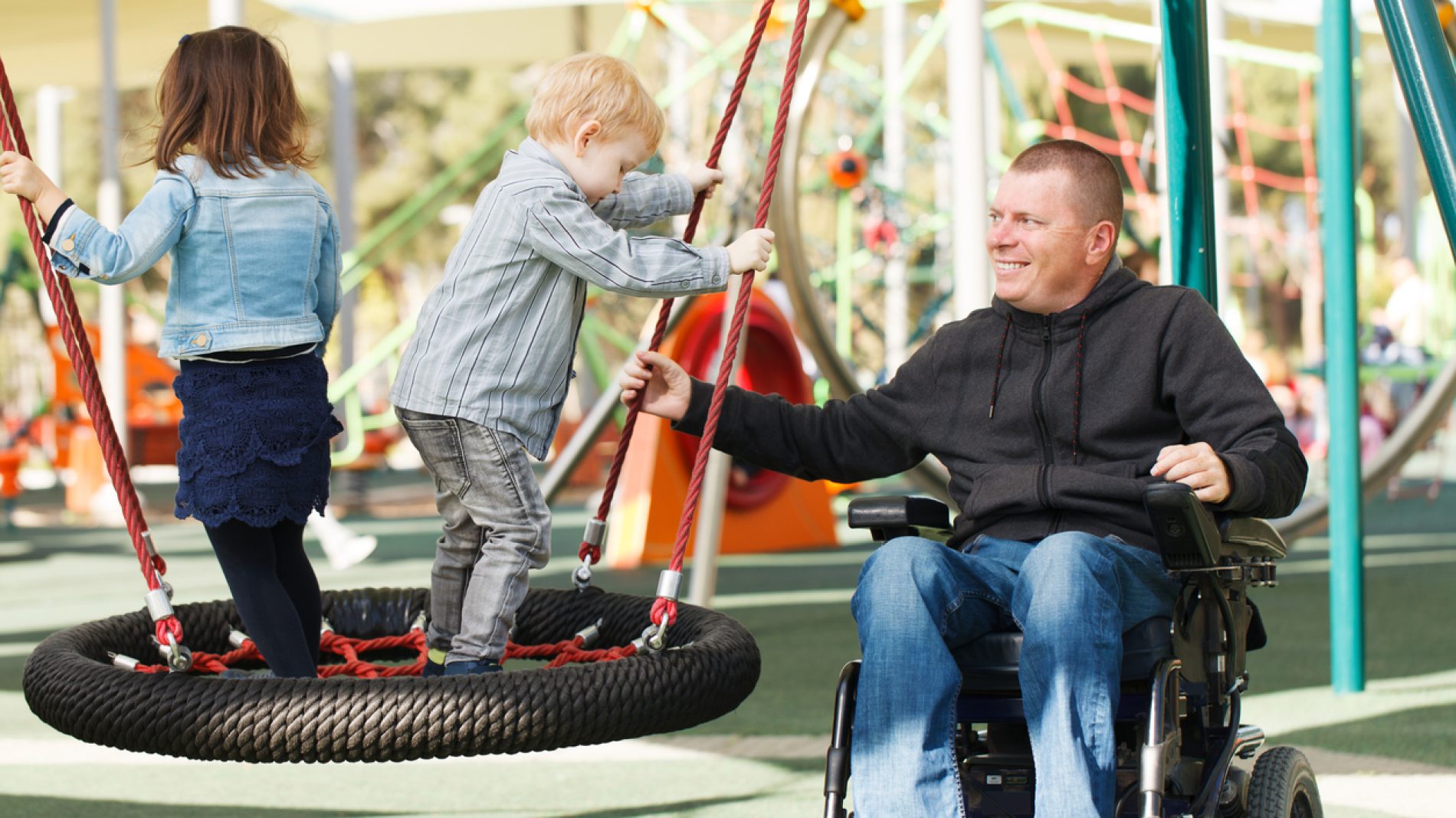 Dad play with son and daughter