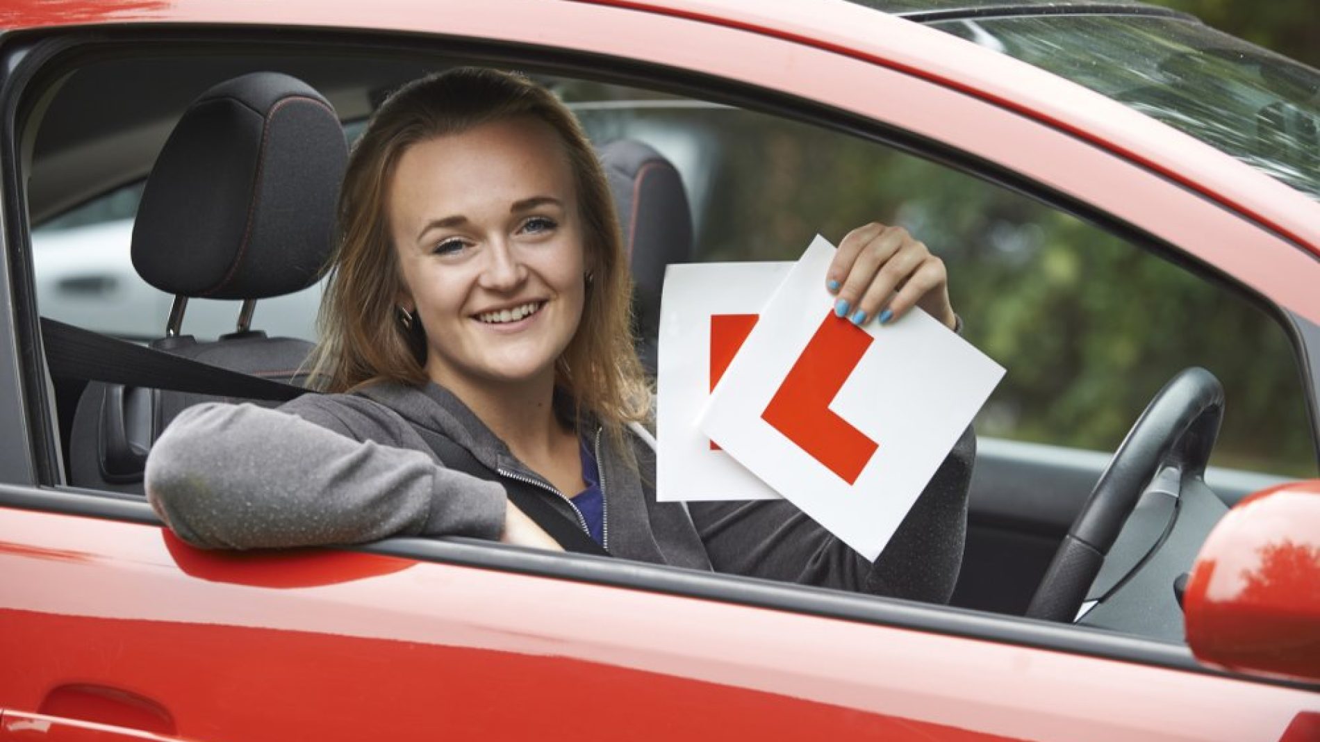 Teenage Girl Passing Driving Exam