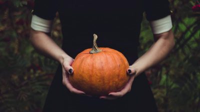 Person Holding Pumpkin