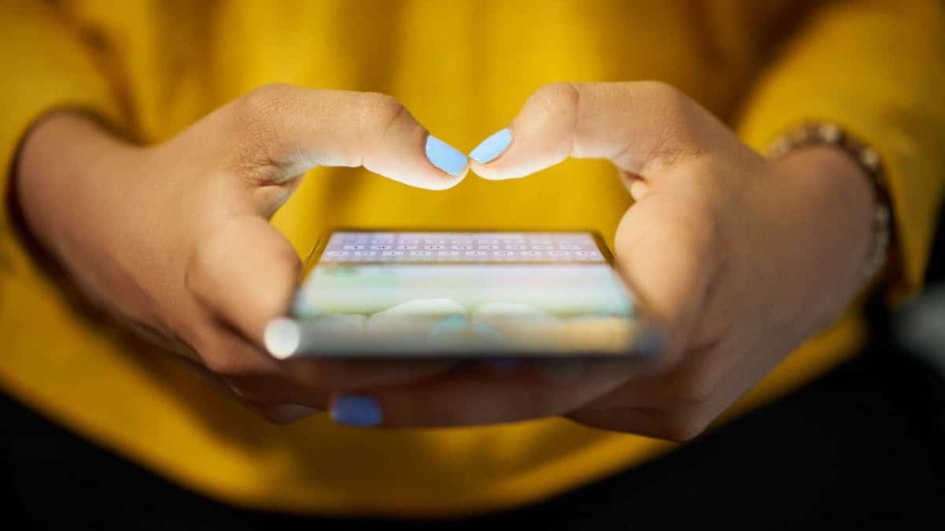 woman's hand using phone