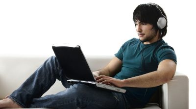 young man on his computer