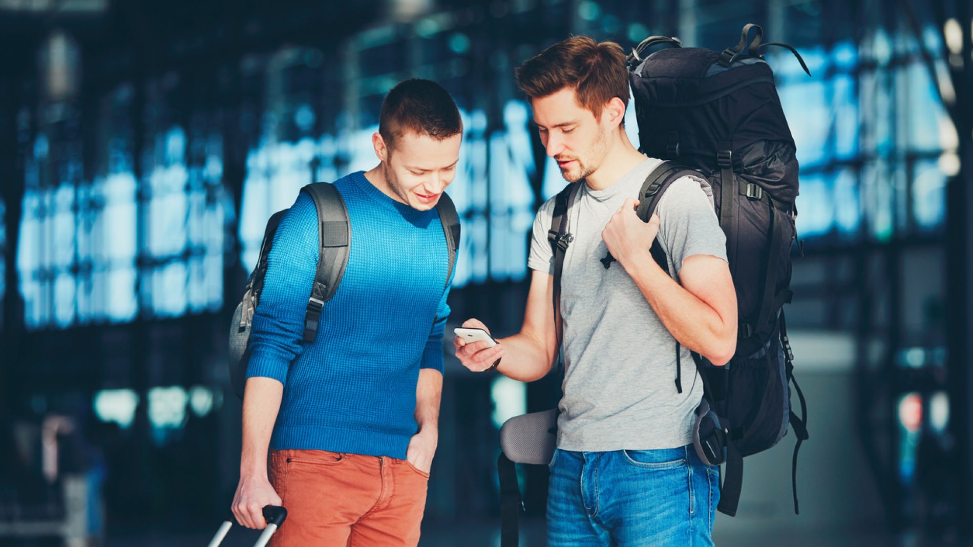 Two young men at the airport