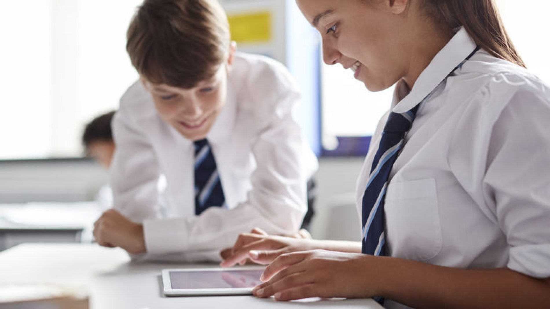 two-students-using-a-tablet