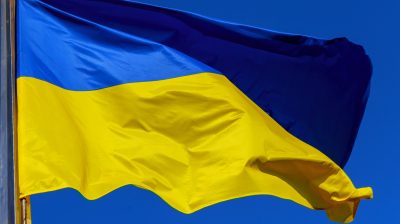 ukrainian-national-flag-in-the-wind-against-the-of-the-sky_t20_Nx89AE